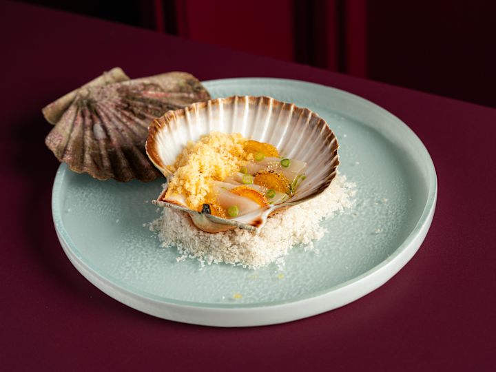 Scallop on a Plate with White Rice at The Pem Restaurant