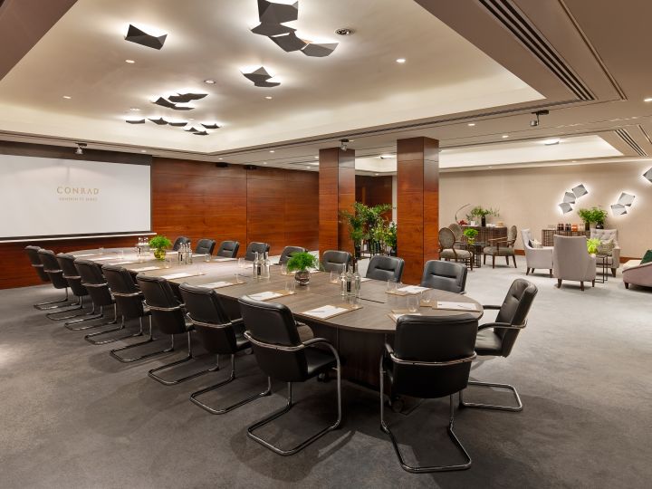 boardroom with large table and lounge area