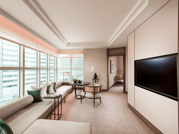 Centennial Suite Living Room wiith Large Windows and Seating Area