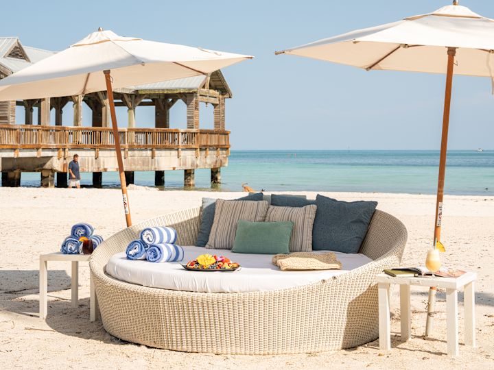 A comfortable Seat at the Beach under Umbrellas