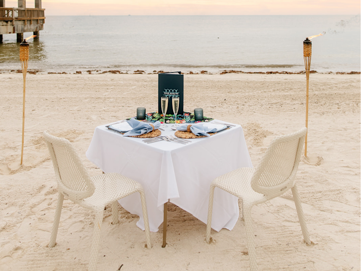 Table Setting on the Beach in the Sand at the Four Marlins Restaurant