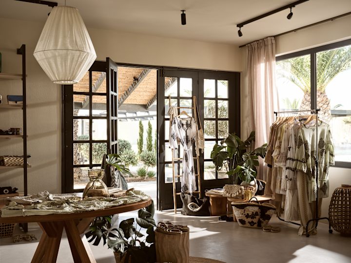 Clothing and other items on display in a store