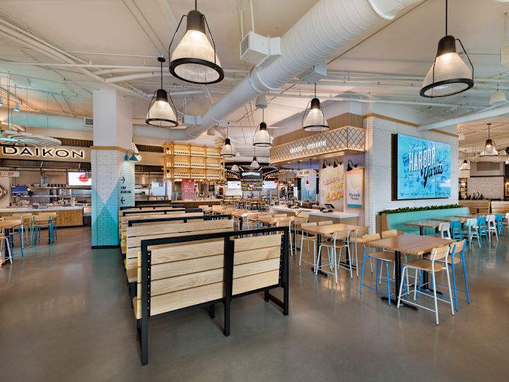 Harbor Yards seating area and screens setup