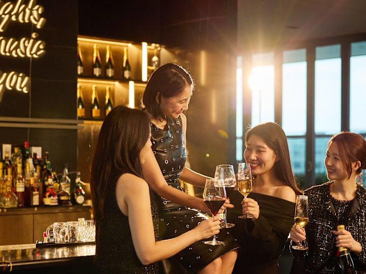 A Group of Women Celebrating the Holidays