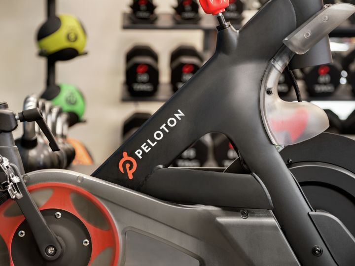 Convenient on-site fully equipped fitness center featuring a Peleton spin bike.