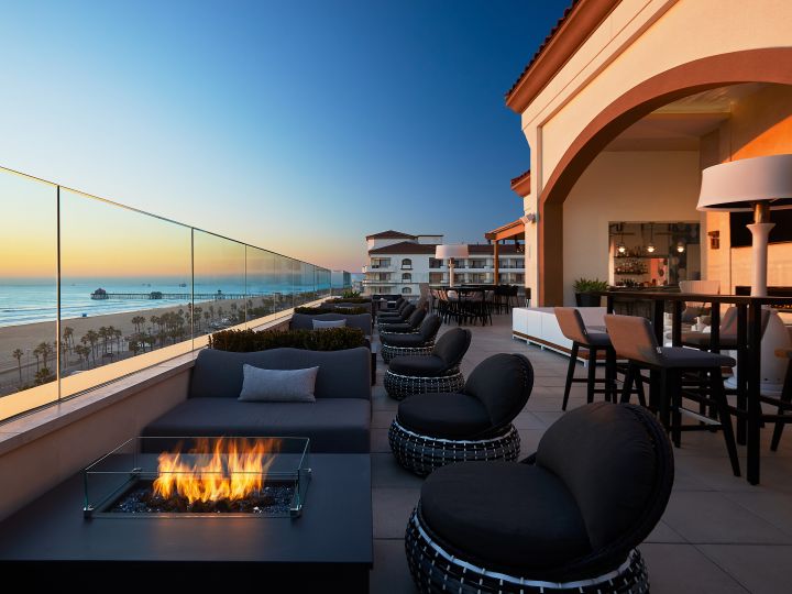 Offshore 9 Rooftop Lounge Terrace with Seats by the Fire Pit