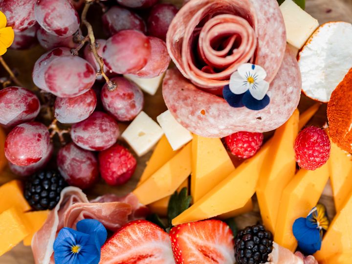 Charcuterie Tray with Fresh Berries, Grapes, Crakers, Cheeses and Meats