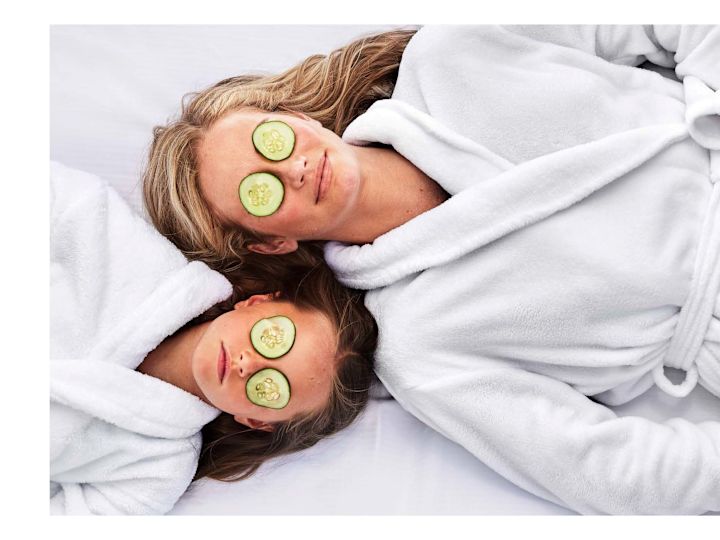 Mother and Daughter Relaxing at Spa Q