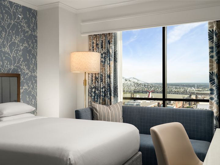 Bed and Sofa in a Guest Room