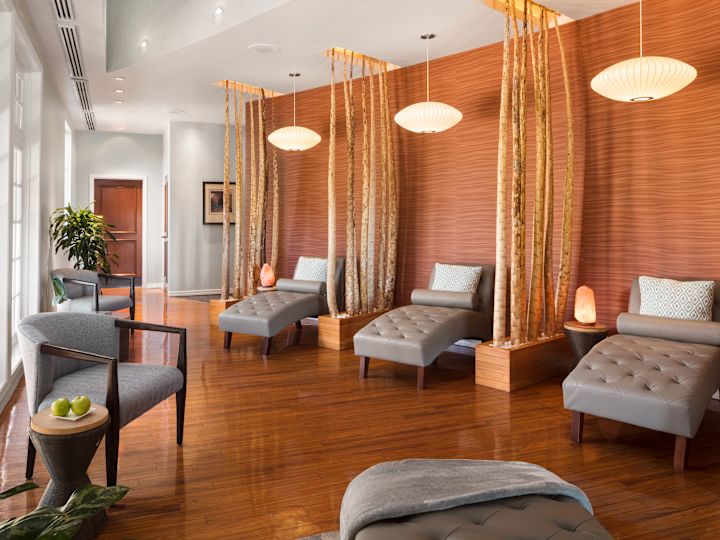 Spa Treatment Area with Spa Massage Beds and Armchairs
