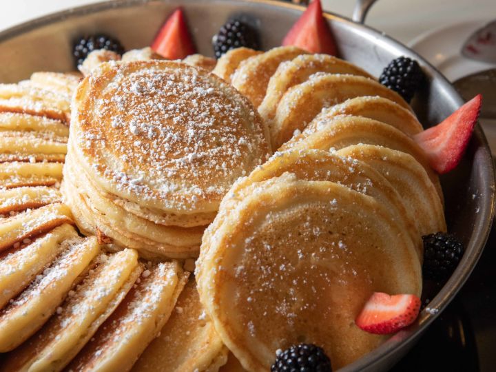 Close-up view of pancakges and strawberries