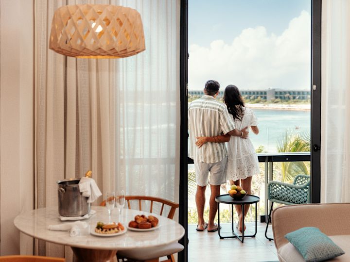 man and woman on balcony