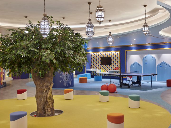 Kids club with colourful decoration and tree