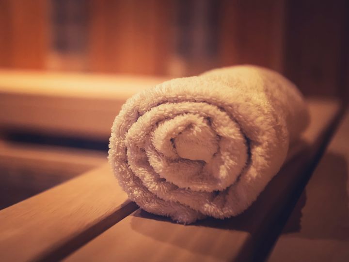 Closeup of a rolled up towel in the sauna