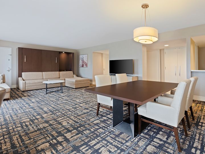 Suite Living Area with sofa, seating and dining table