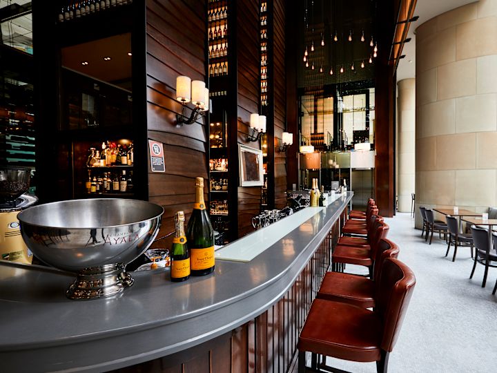 Bar area with tables and stools