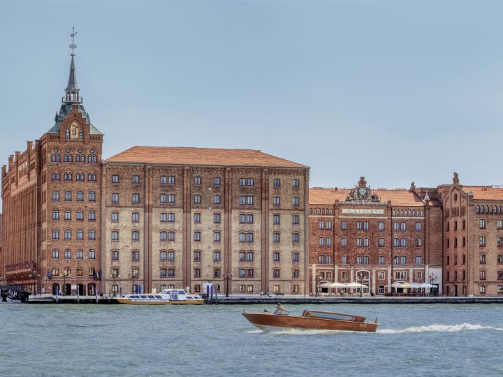 view of hotel exterior from the water