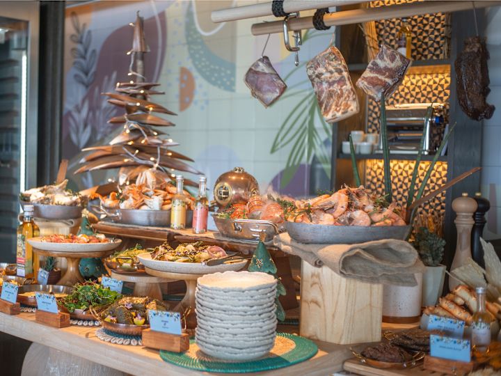 Elara restaurant, buffet table with seafood trays and salad plates