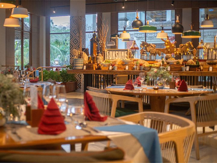 Grain restaurant dining room with holiday decorations and buffet table