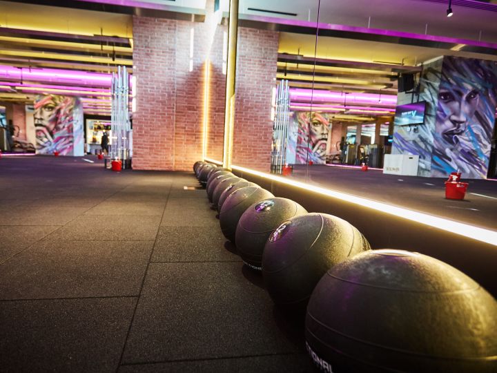 Row of medicine balls in fitness centre