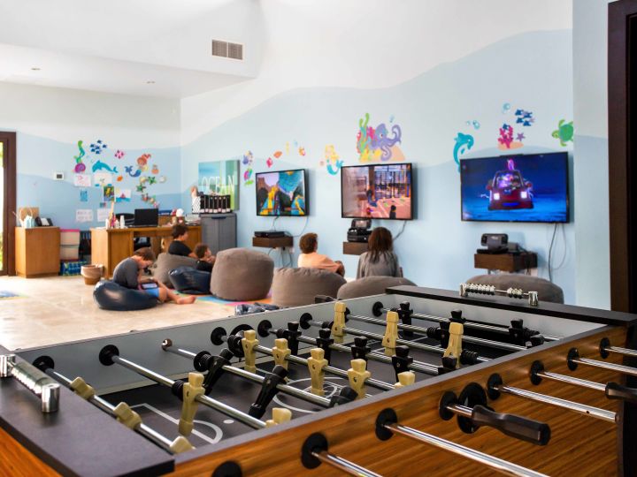 Kids playing in games room