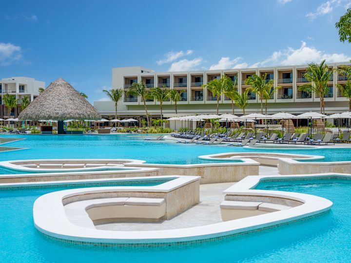 Shot of pool with loungers in background