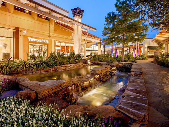 Shop view at La Cantera with water feature in middle