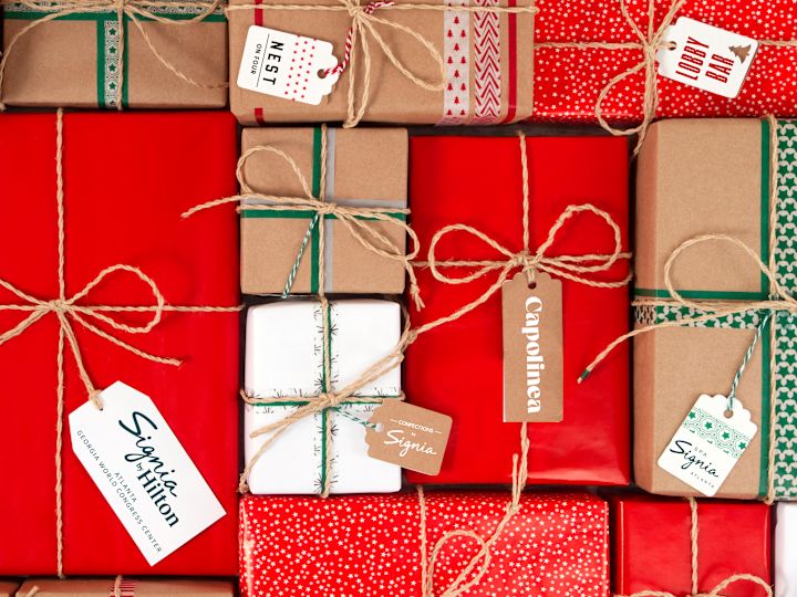 holiday wrapped gifts with Signia tags