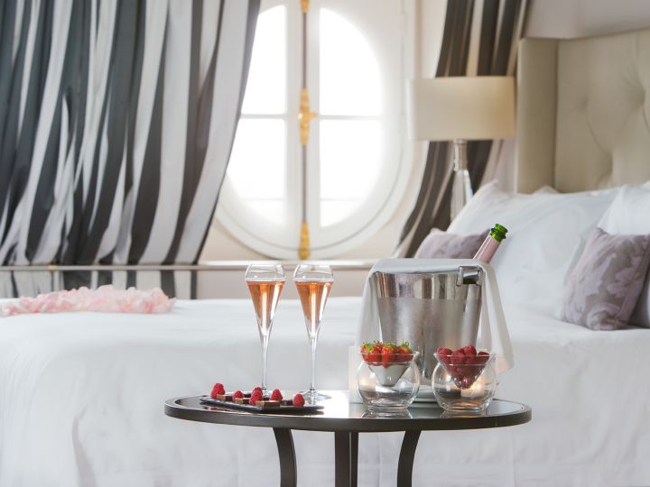 champagne and berries in guest room