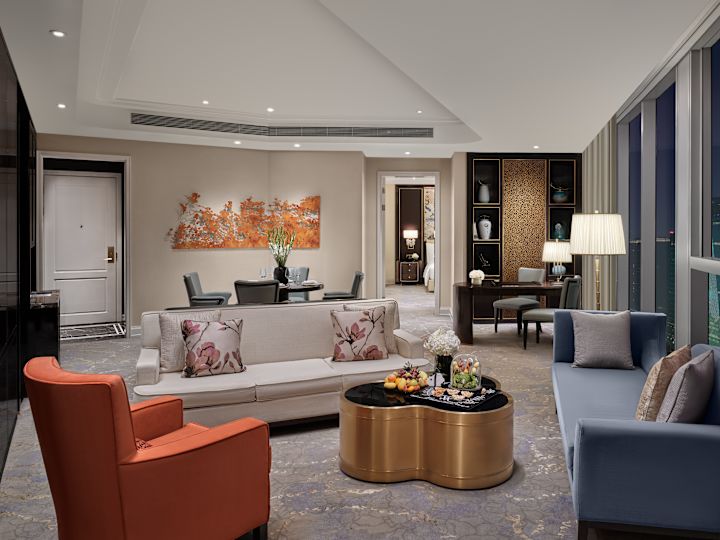 guest suite lounge area, sofas, table, chair, work desk