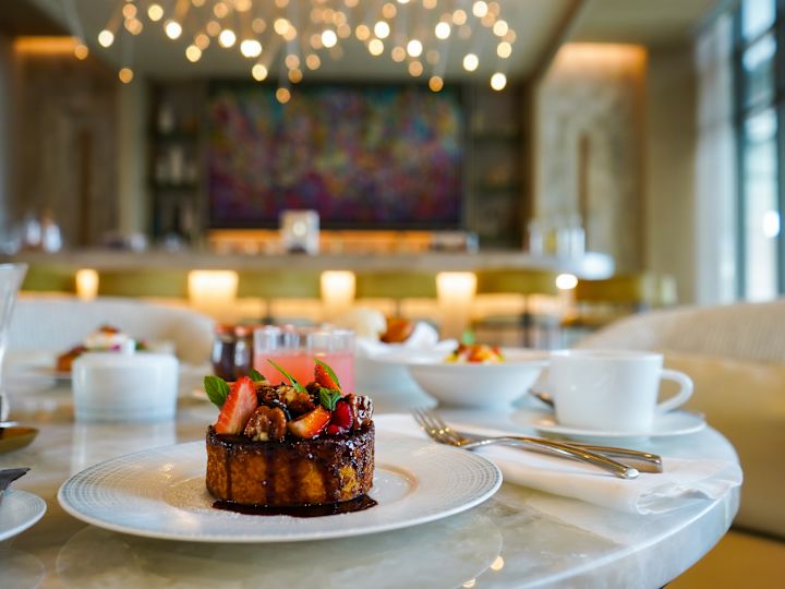 Chocolate and Strawberry Cake on a Plate in a Restaurant