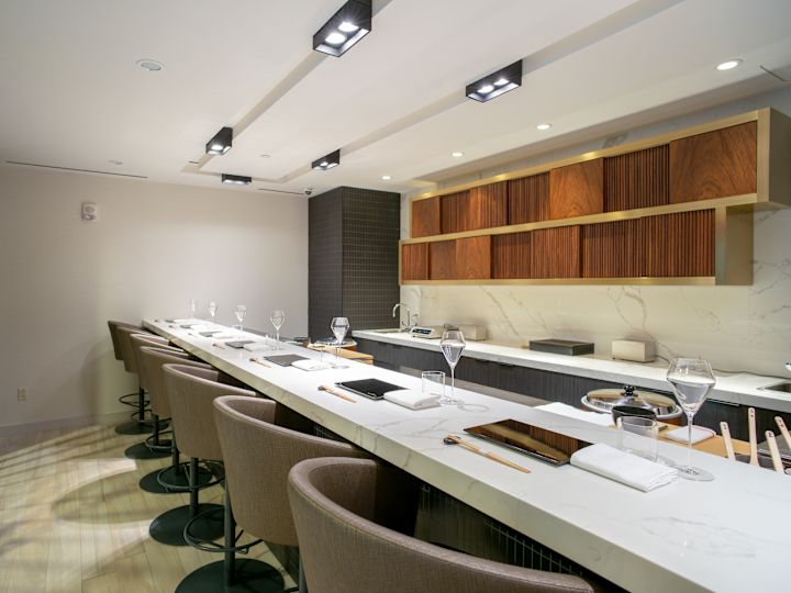 Bar with curved chair setup