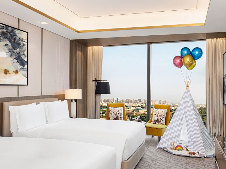 Family themed room setup with tent in corner for children