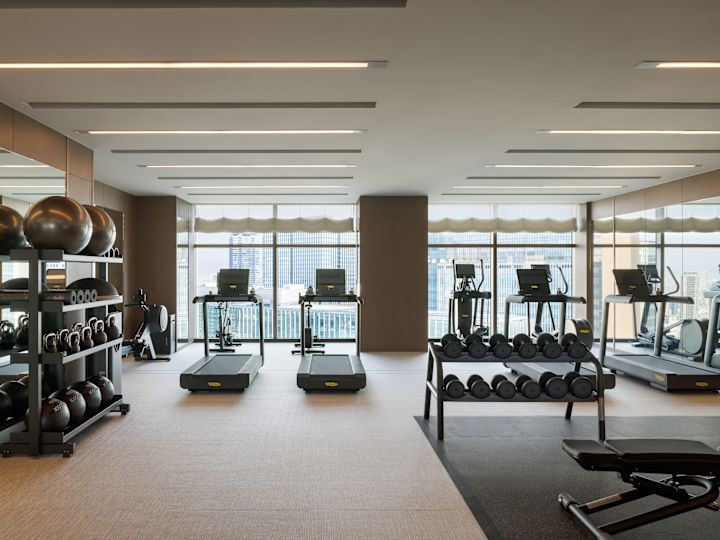 Fitness center with cardio machines and free weights