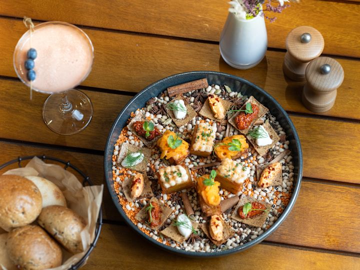 Azure restaurant with food on table with drinks