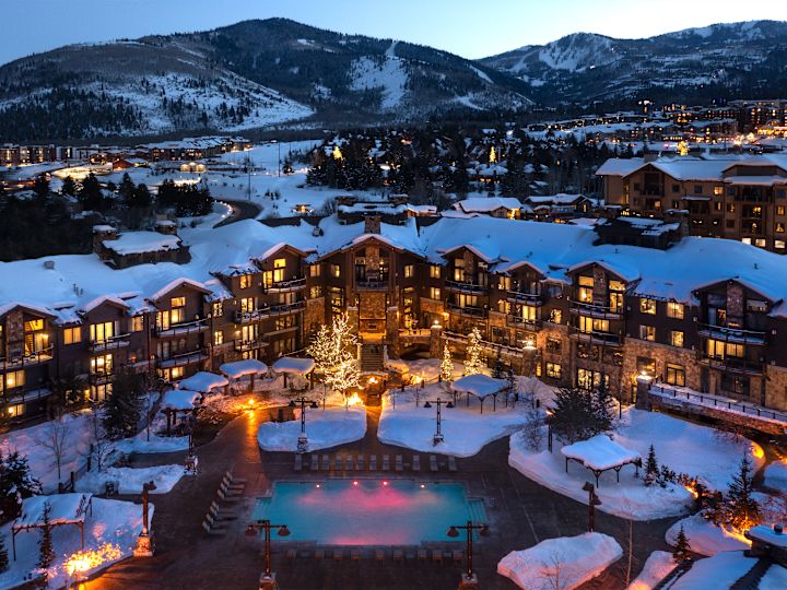 Hotel Exterior in the Evening and View of Park City Mountain