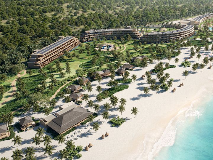 Photo aérienne du complexe avec plage, arbres et bâtiments