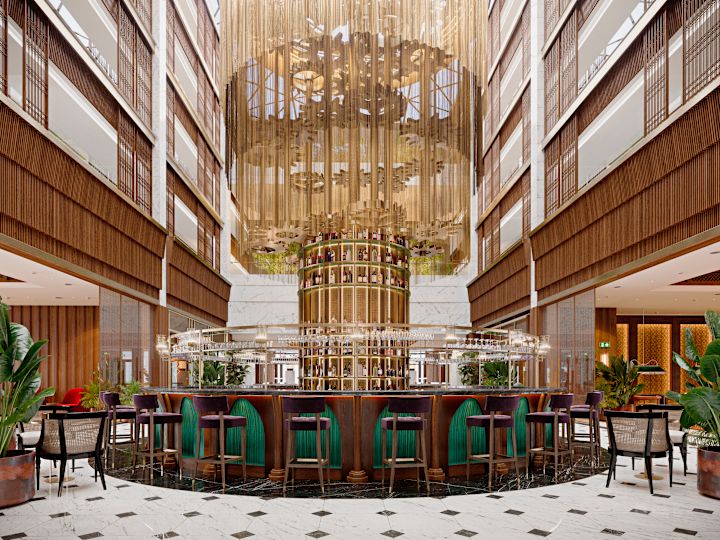 Элегантный бар в вестибюле с креслами и стеклянным потолком