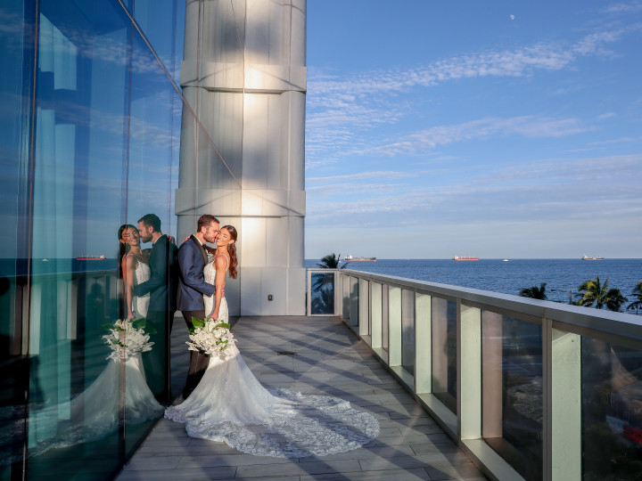 Wedding Couple Outside on Balcony