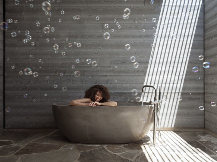 View of woman in spa bathtub