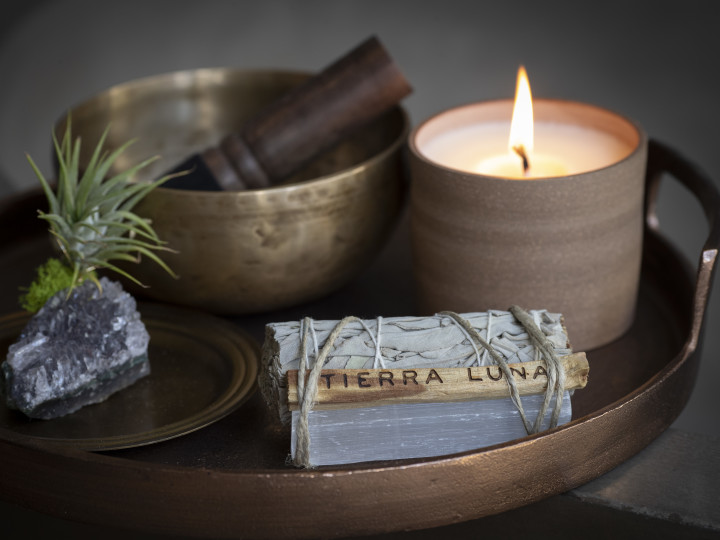 Close-up of spa treatments and candle