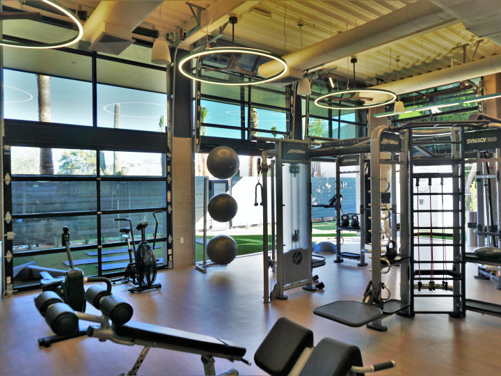 Fitness center with benches and cardio machines