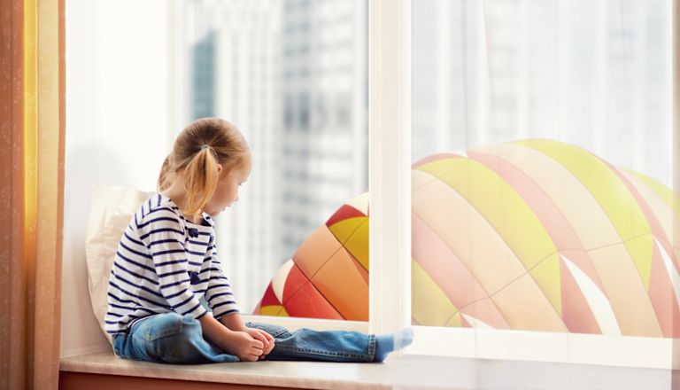 Little girl look at balloon