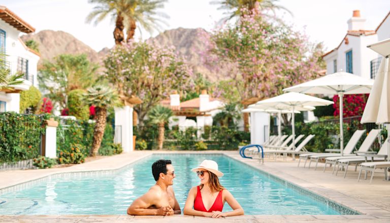 Man and woman relaxing in pool