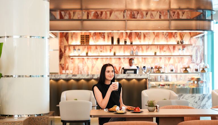 A Woman Dining in a Restaurant