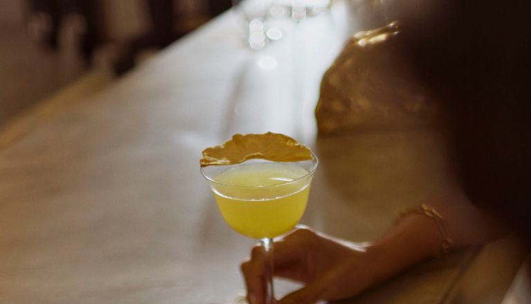 Woman and man enjoying drinks at the bar