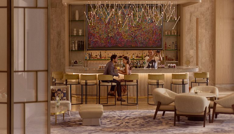 couple sitting by bar