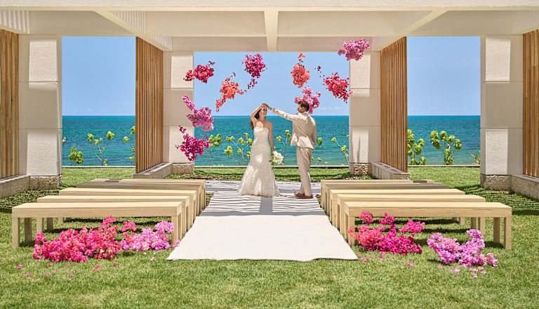 Wedding Pavillion, flowers, bride & groom dancing