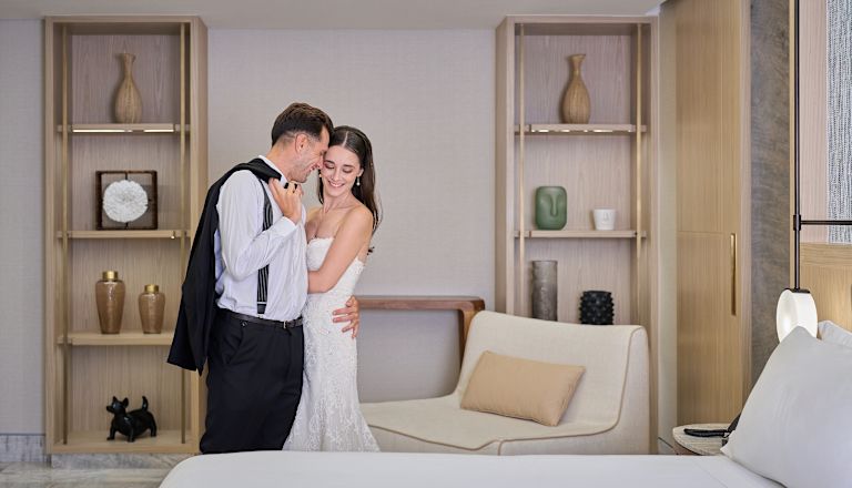 bride & groom hugging