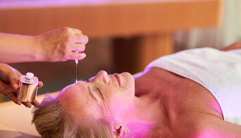 Astoria Spa person on Spa table